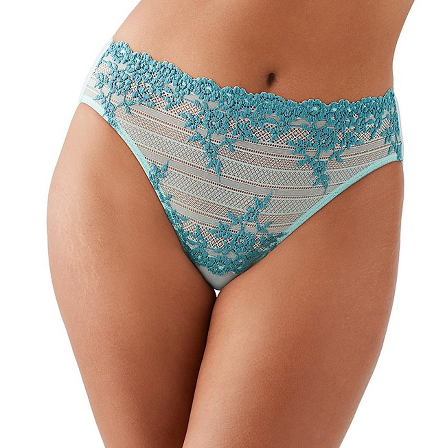 High waist full brief in sheer eggshell/brittany blue panty with tonal embroidery details. Front view on model.