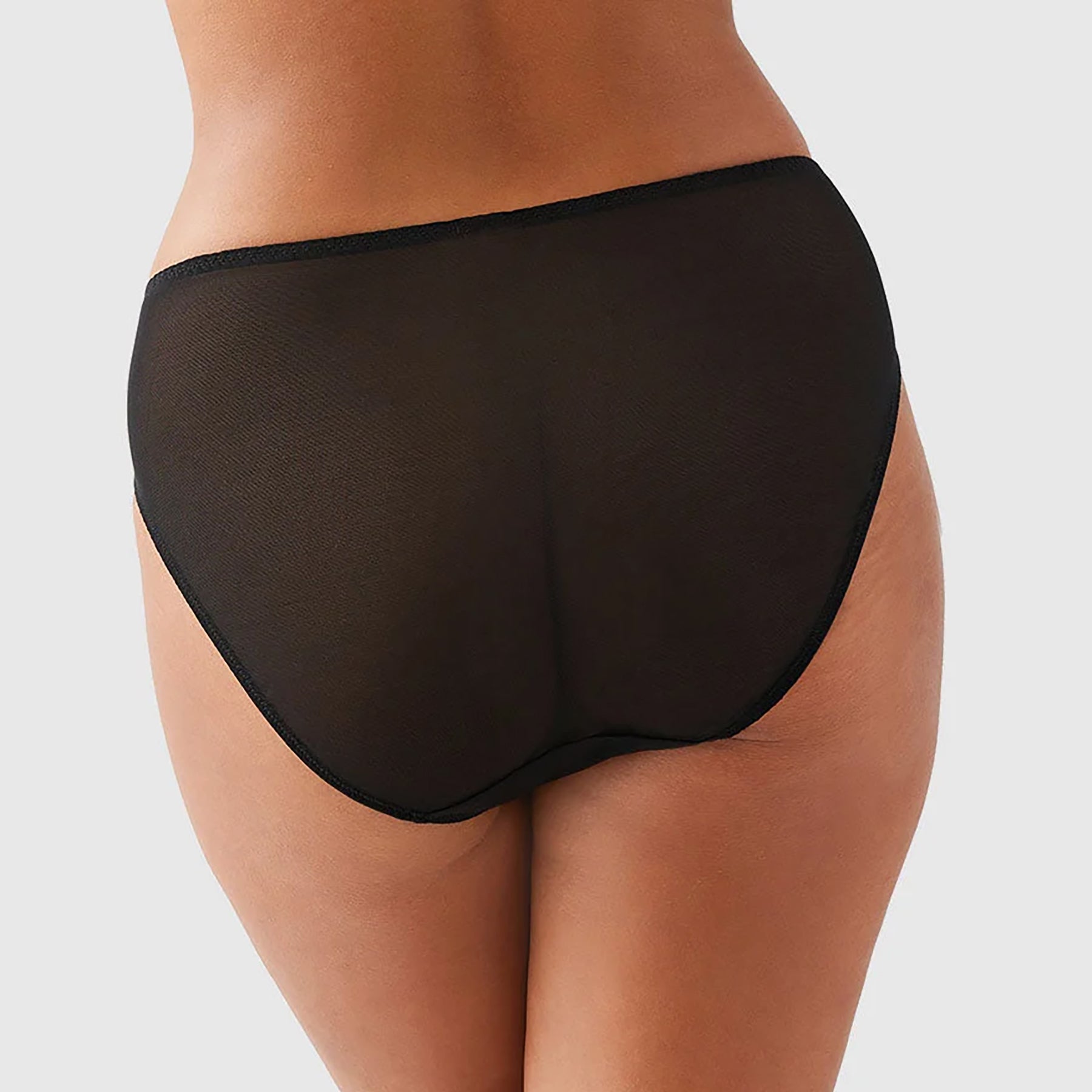 Wacoal embrace lace high waist sheer black mesh brief 841191 with cream lace embroidery details. Rear view close up on model.