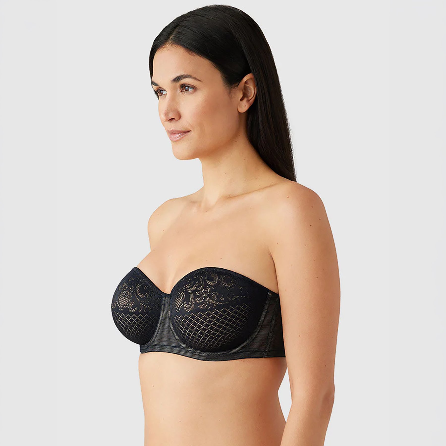 Side view of Wacoal 854310 Minimizing Strapless Bra in Black with seamless support and secure strapless fit.