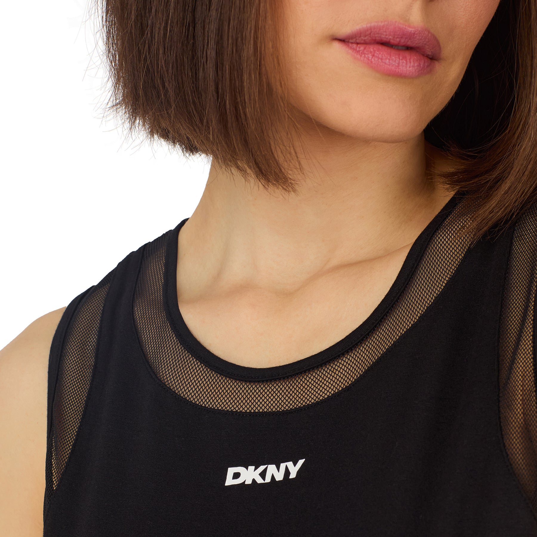 Close-up of black DKNY sleeveless lounge top with sheer mesh neckline detail