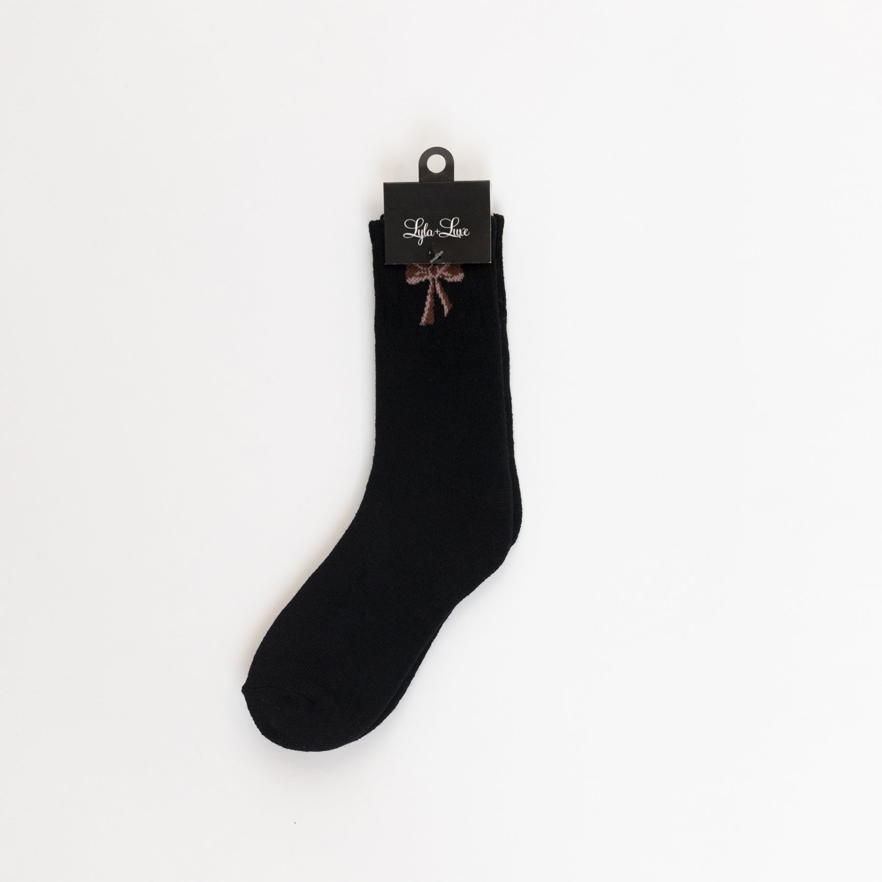 Black women’s crew sock with decorative bow near the cuff.