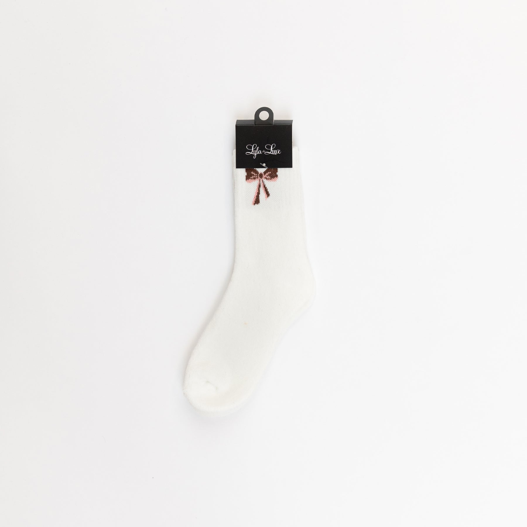 White women’s crew sock with decorative brown bow near the cuff.